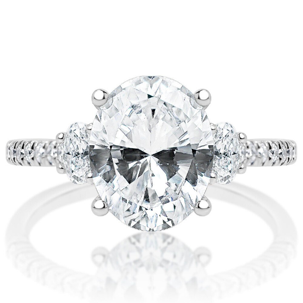 Oval Diamond with sidestones Engagement Ring