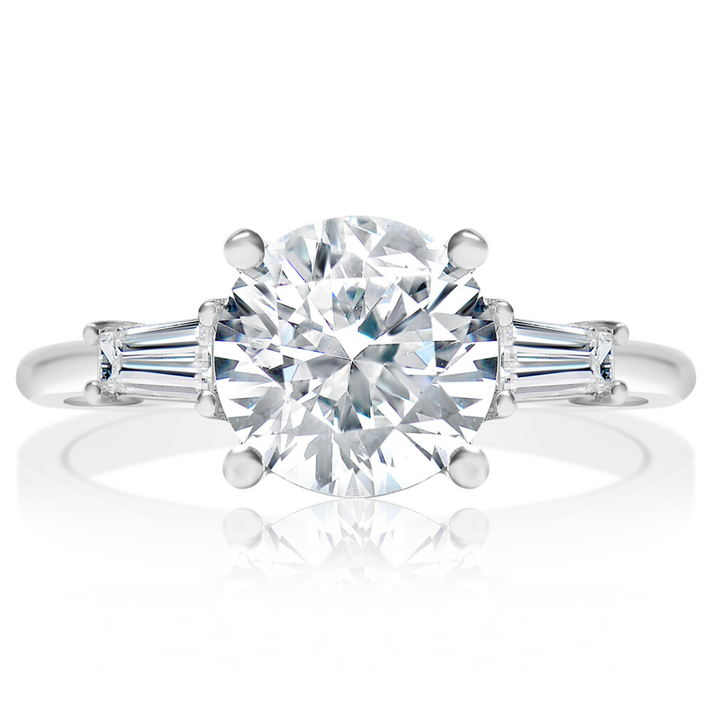 Round Three Stone Engagement Ring