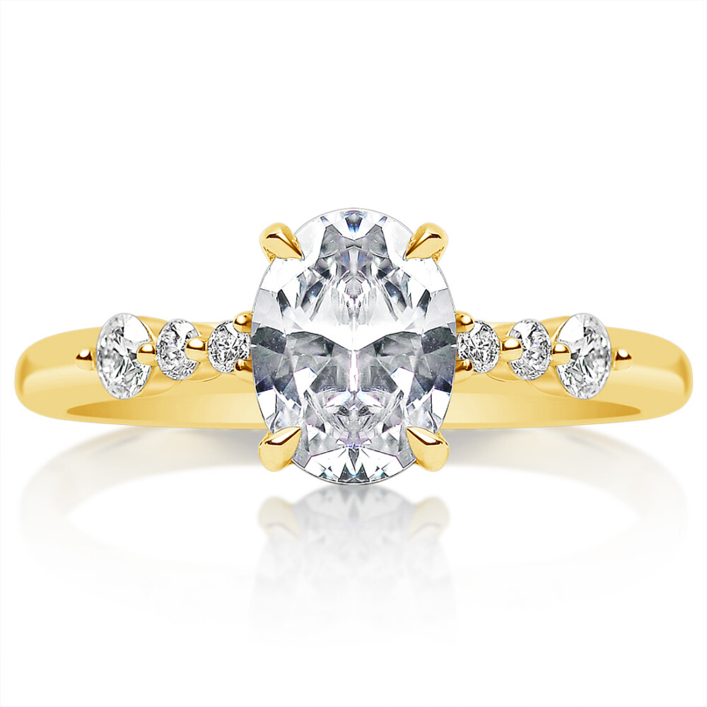 Oval Diamond Graduated Diamond Engagement Ring