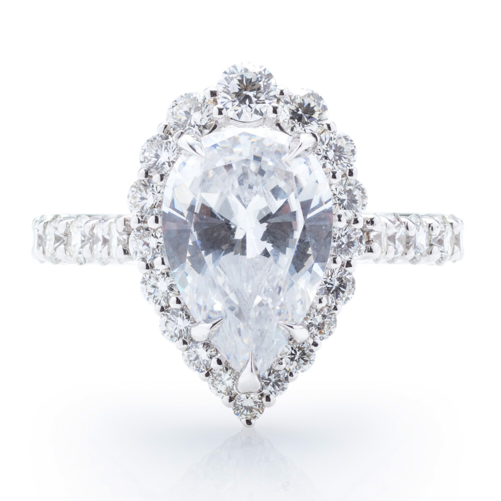 Pear Diamond Eagle Claw Halo Engagement Ring