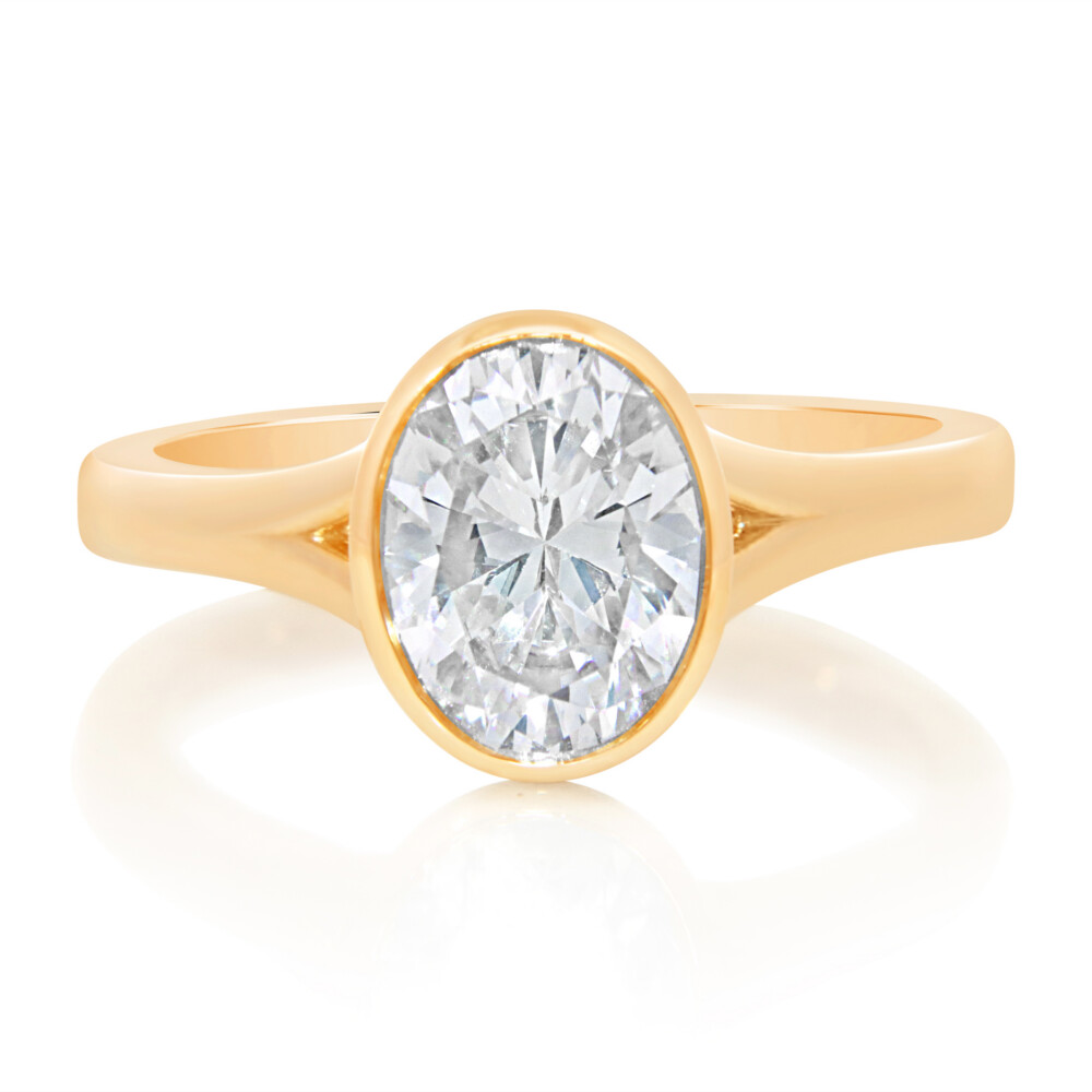 Oval Bezel Surprise Cluster Engagement Ring