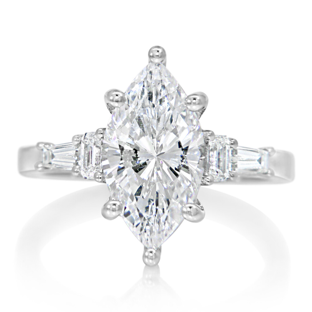Emerald and Tapered Baguette Five Stone Ring