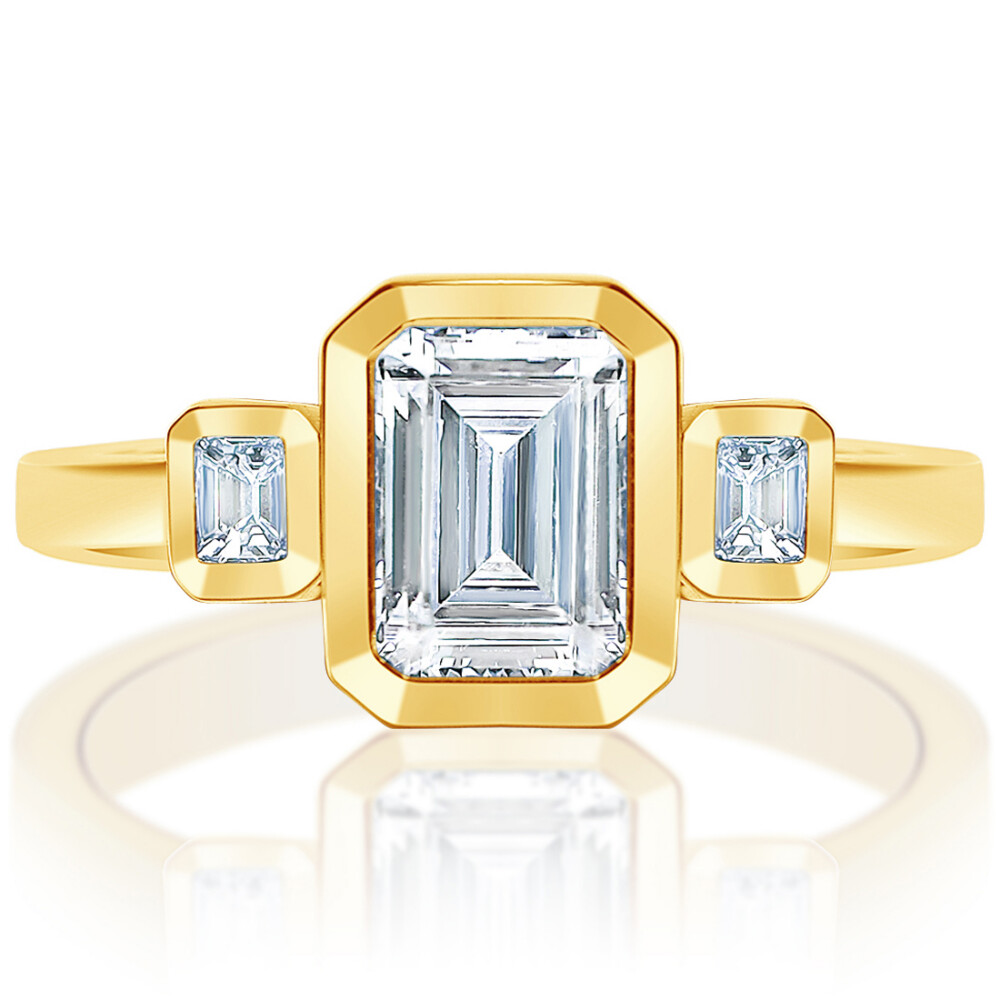Emerald Bezel Three Stone Engagement Ring