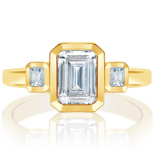 Emerald Bezel Three Stone Engagement Ring