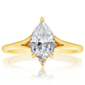 Pear and Round Diamond Accent Engagement Ring