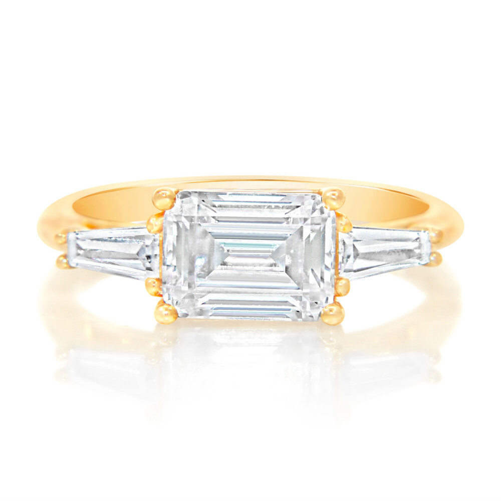 Emerald and Tapered Baguette Three Stone Engagement Ring