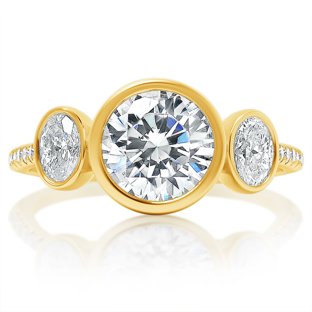 Round and Oval Three Stone Bezel Engagement Ring