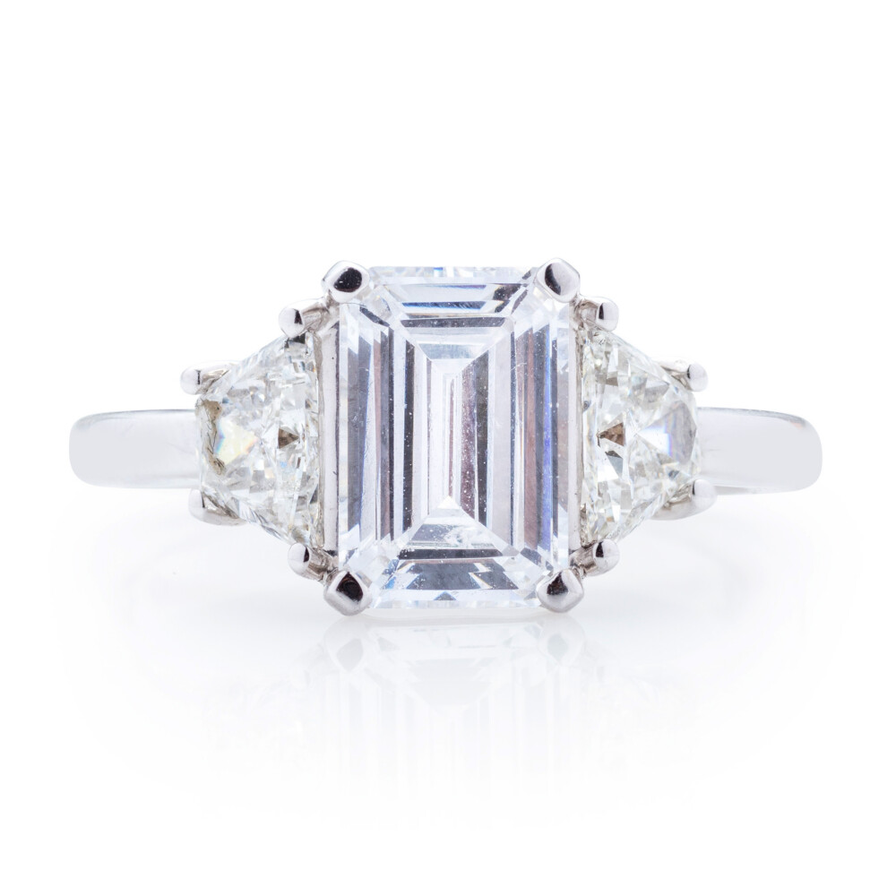 Emerald Three Stone Trapezoid Sidestone Engagement Ring