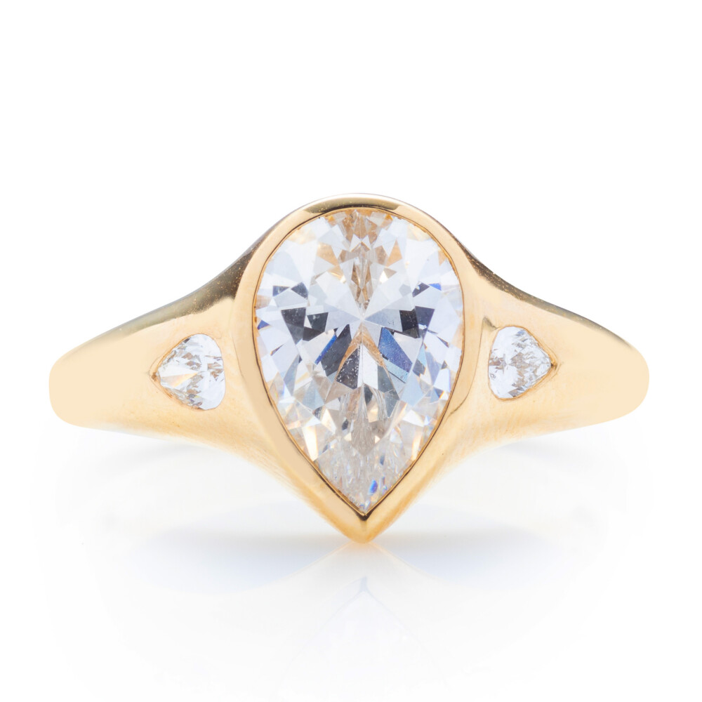 Pear Diamond Bezel Three Stone Engagement Ring