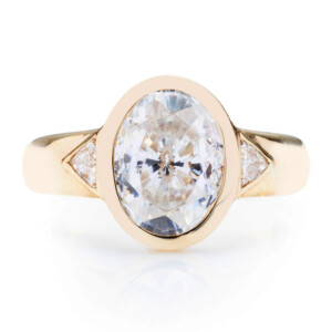 Oval and Trillion Three Stone Engagement Ring