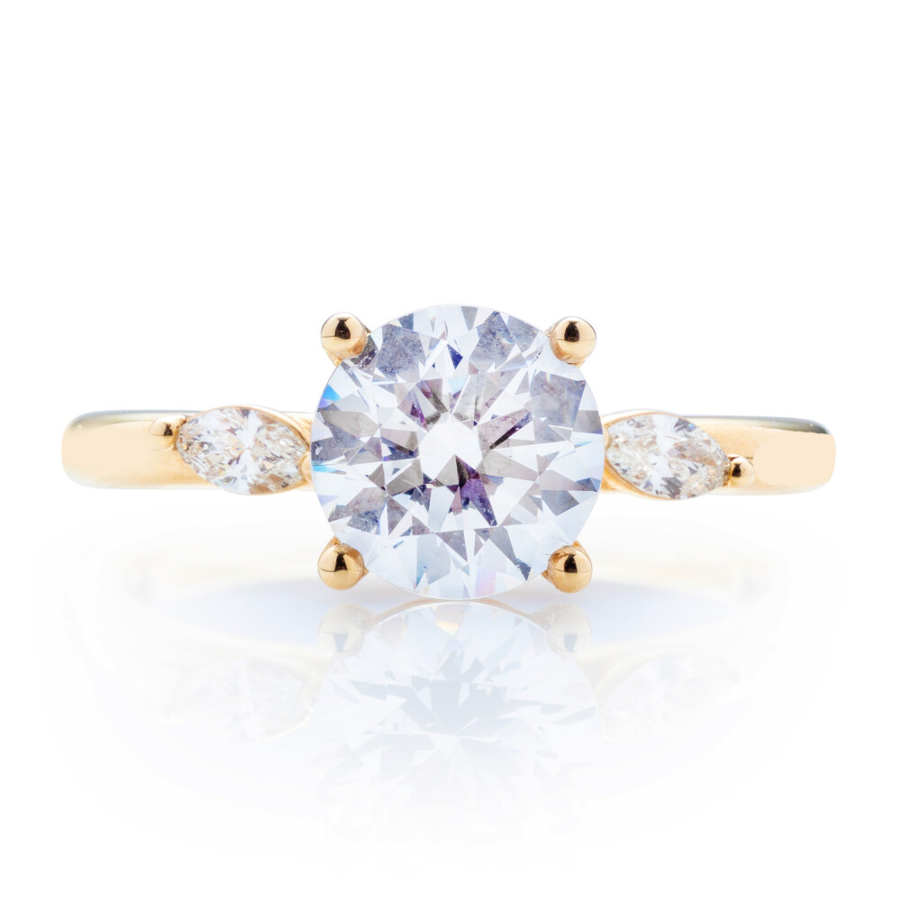 Round Diamond Slanted Accent Diamond Engagement Ring