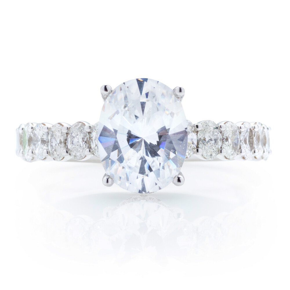 Oval Diamond Shank Hidden Halo Engagement Ring