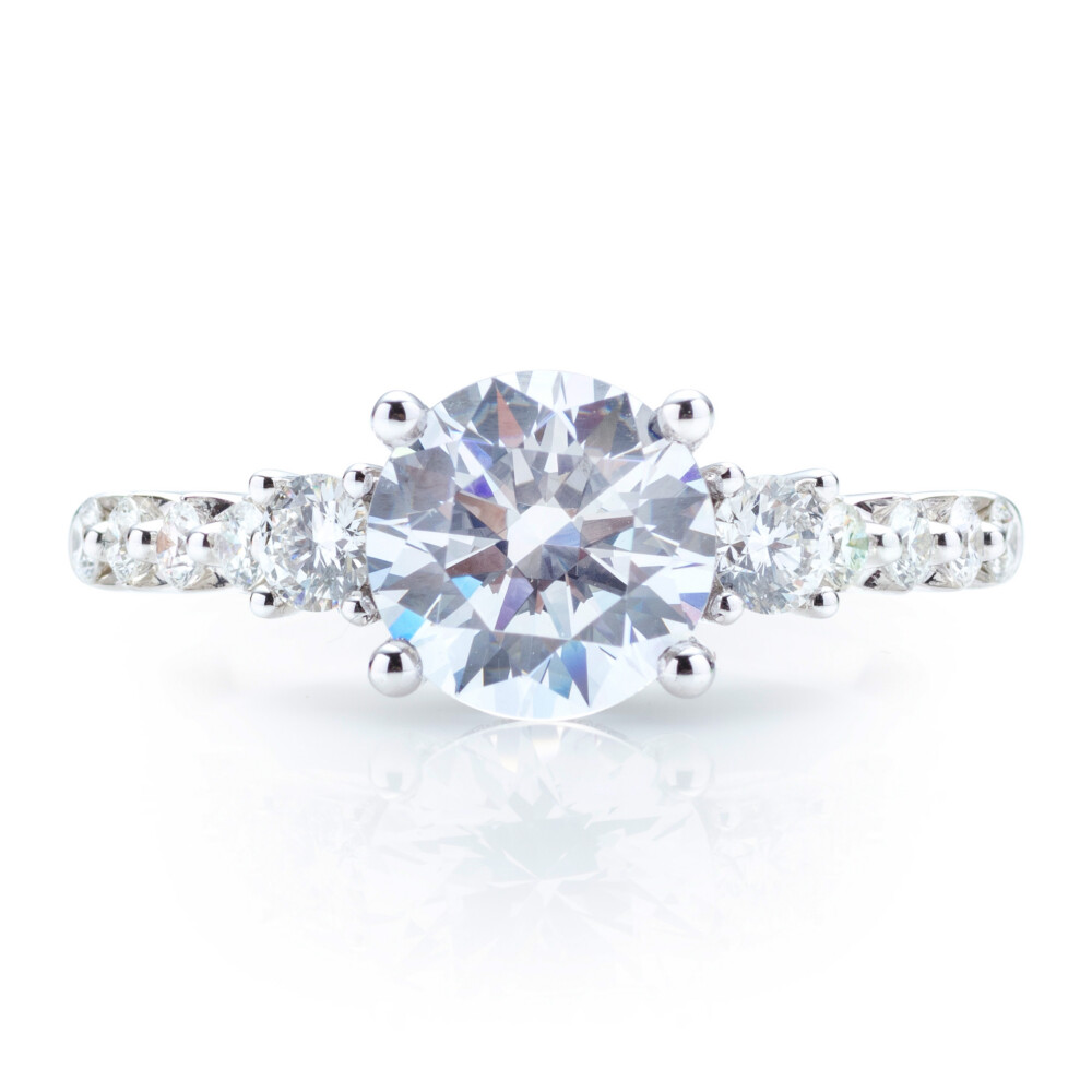 Round Three Stone Diamond Shank Engagement Ring