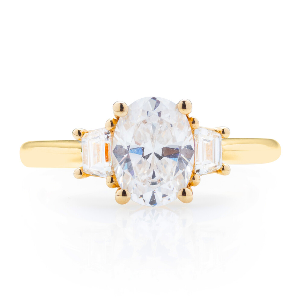 Oval with Trapezoid Three Stone Engagement Ring