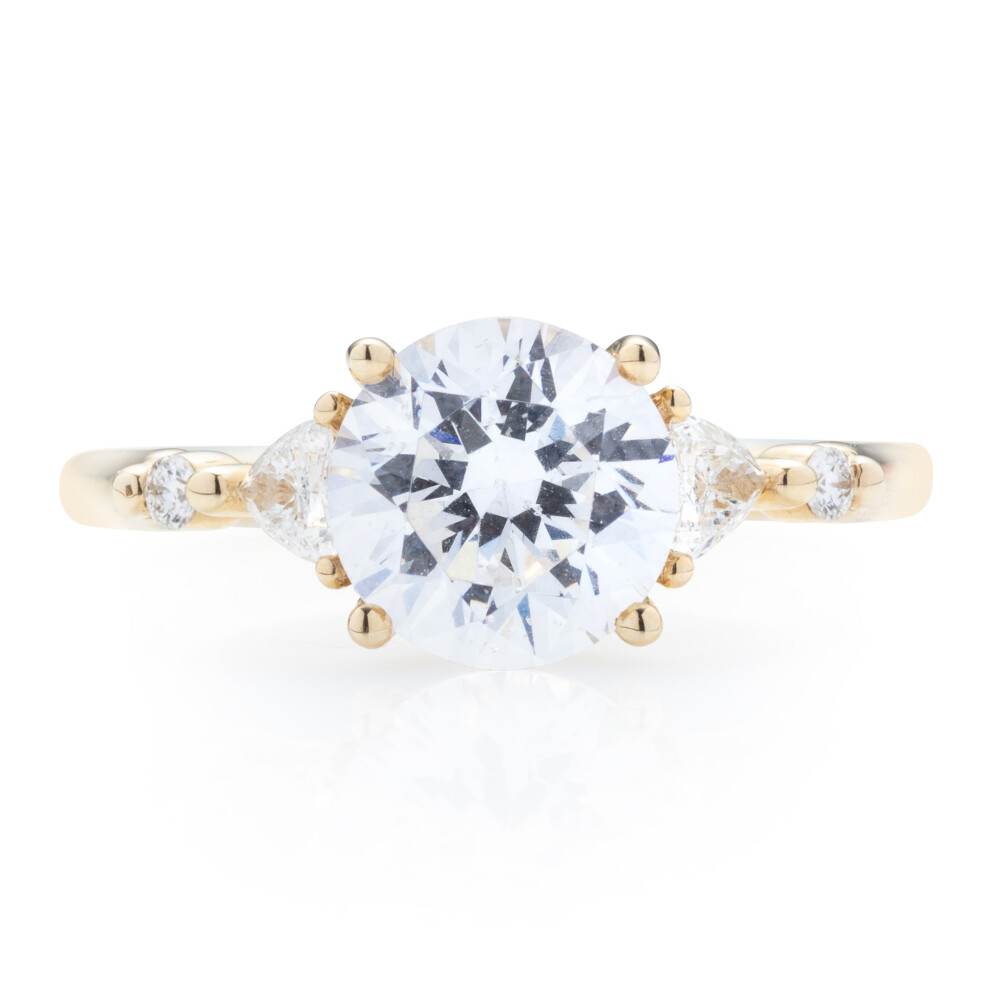 Trillion and Round Five Stone Engagement Ring