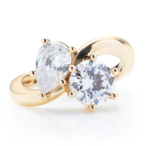 Round and Pear Curved Engagement Ring