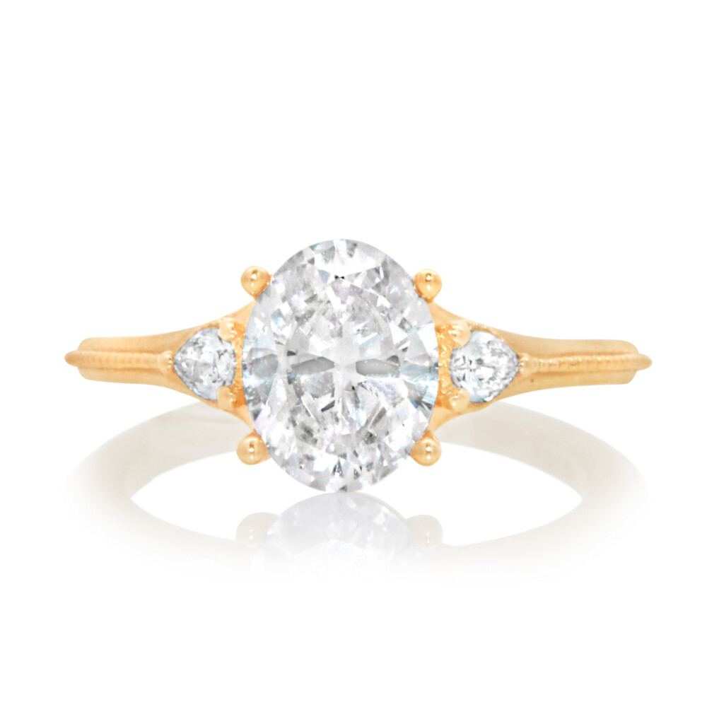 Oval and Pear Three Stone Engagement Ring