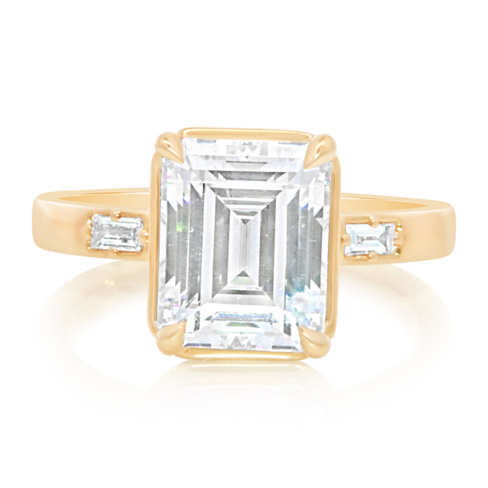 Emerald and Baguette Three Stone Engagement Ring